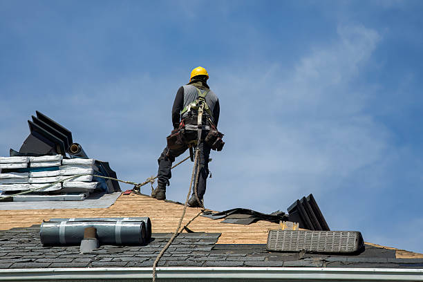 Professional Flat Roof Repair technician working in Portland, MI